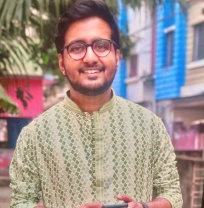 Srijan Roy Sir in a green kurta